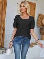 Plush Fashion Hub eyelet asymmetrical neck short sleeve T-shirt with stylish design and unique neckline, worn by a model.