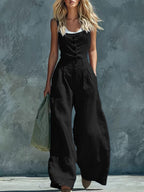 Women's retro button-front high-waist wide-leg jumpsuit by FitiqueFit, casualwear style, shown in natural fabric with wide-leg design.