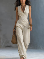 Women's V-neck crossover tank top and casual trousers two-piece set by Plush Fashion Hub, shown laid flat on a neutral background.