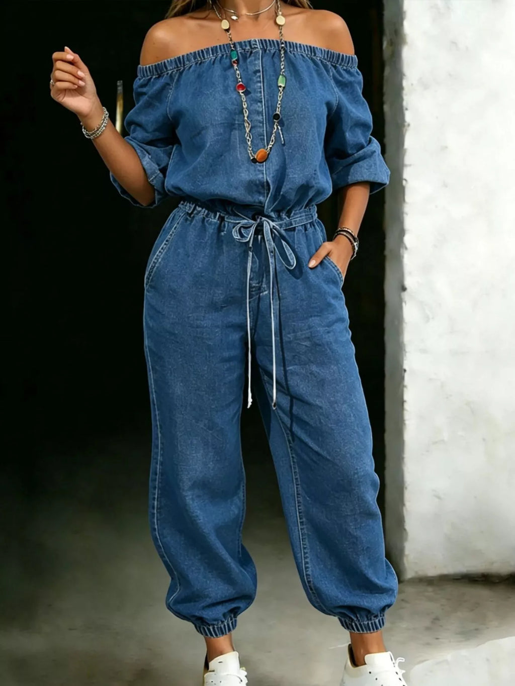 Off-shoulder jumpsuit with pockets by Shopimist, featuring a stylish design and comfortable fit, shown on a model.