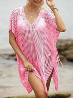 Openwork V-neck slit cover-up by Trendsi, lightweight and breezy with intricate openwork design and V-neck style.