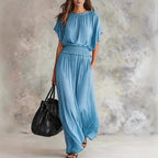 Women's chiffon high-waist ruched maxi dress by FitiqueFit, flowing fabric with gathered details and a flattering silhouette.