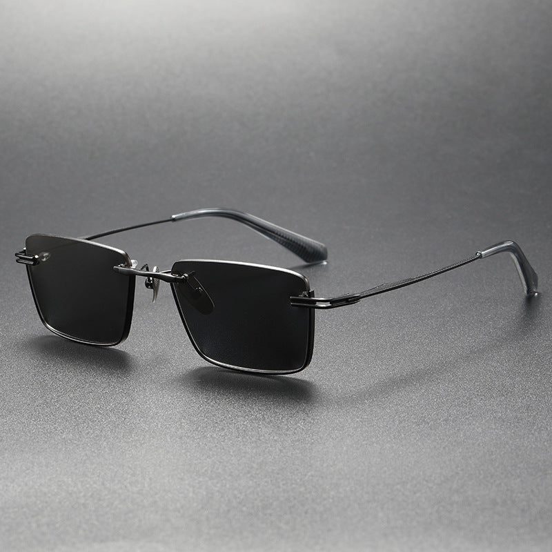 Pure titanium polarized sunglasses in retro British style, featuring classic frame design and tinted lenses by FitiqueFit.