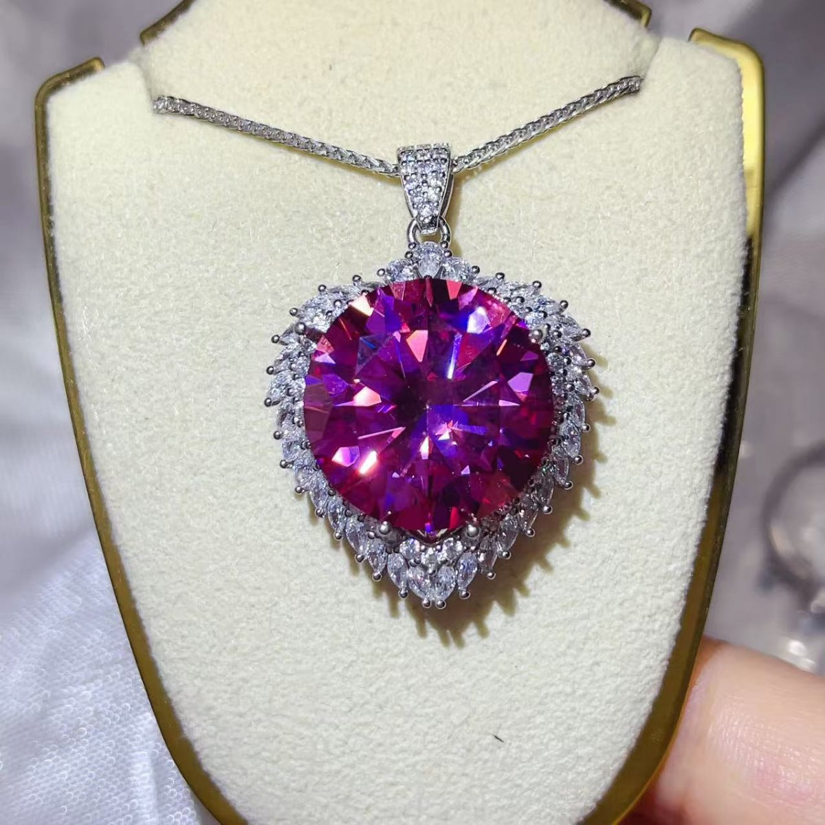 20 carat moissanite pendant necklace in 925 sterling silver, featuring a sparkling gemstone on a delicate chain.