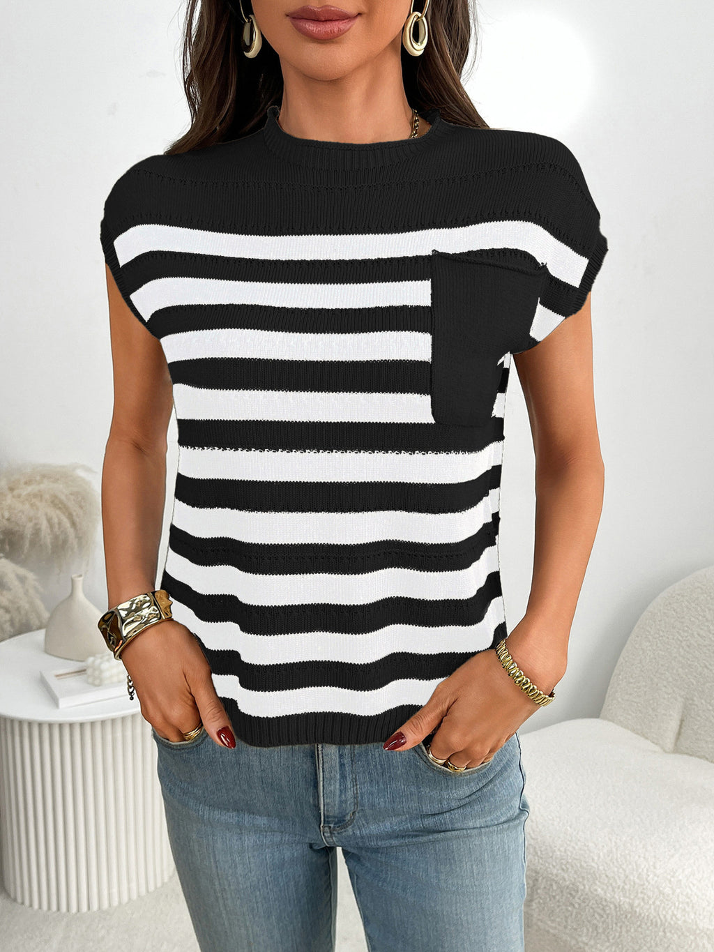 Women's striped knit cap sleeve sweater with pocket detail, casual outerwear by Trendsi, shown in a close-up image.