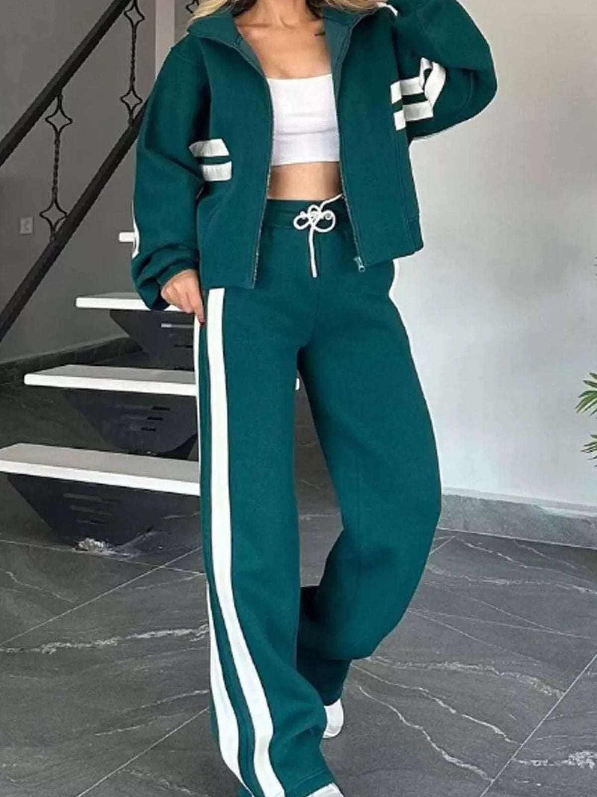 Plus size contrast stripe zip-up jacket and matching activewear pants set by Plush Fashion Hub, shown in a comfortable athletic fit.