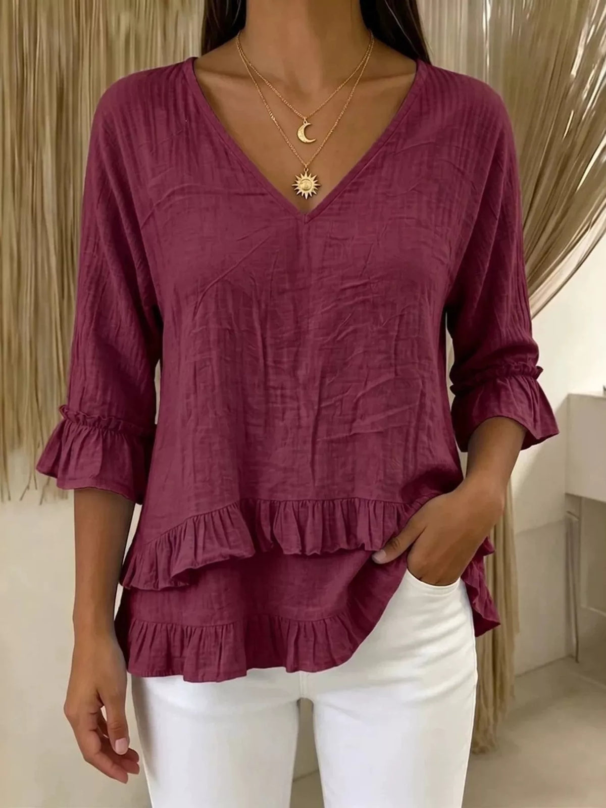V-neck ruffle sleeve blouse by Trendsi featuring lightweight fabric and feminine ruffle details on the sleeves.
