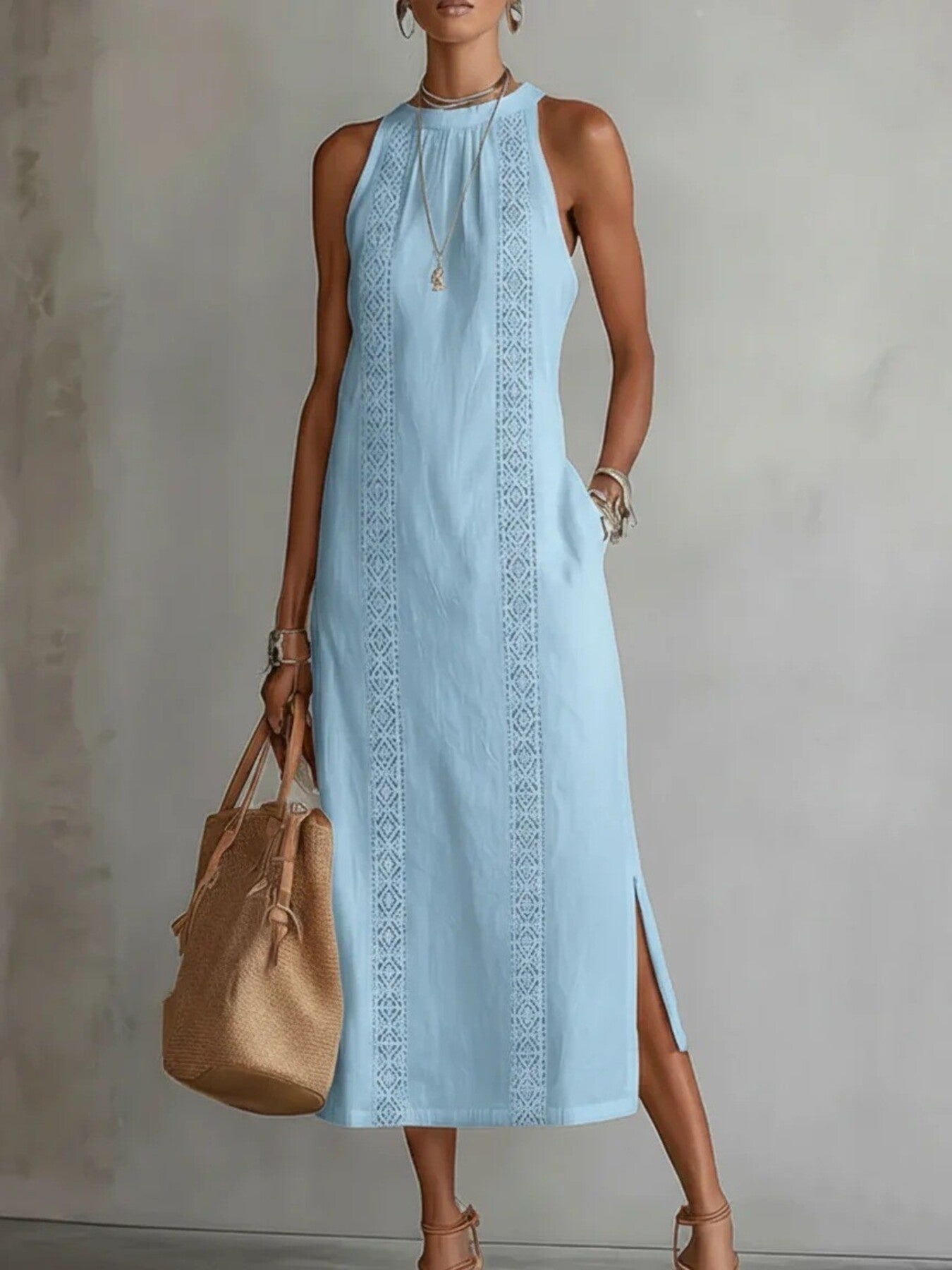 Sleeveless hollow-out midi dress with side slit and pockets by Plush Fashion Hub, shown in a stylish, casual design.