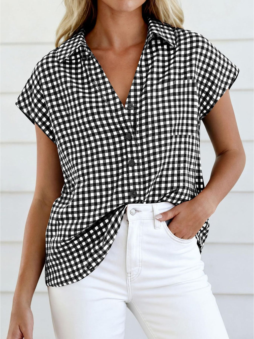 Women's classic gingham print button-down shirt with tie detail, stylish and casual top by Trendsi.