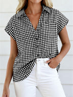 Women's classic gingham print button-down shirt with tie detail, stylish and casual top by Trendsi.
