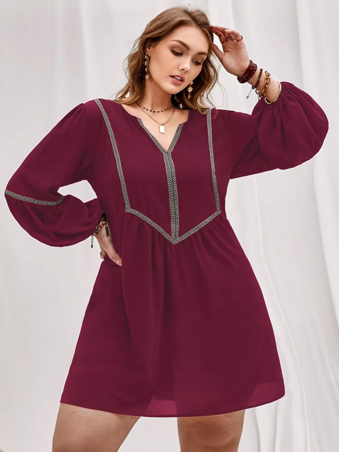 Plus size notched balloon sleeve mini dress by Shopimist, featuring a stylish notch neckline and flowy silhouette.