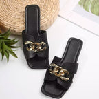 Chain embellished slide sandals from Plush Fashion Hub featuring a stylish open-toe design and trendy chain details.
