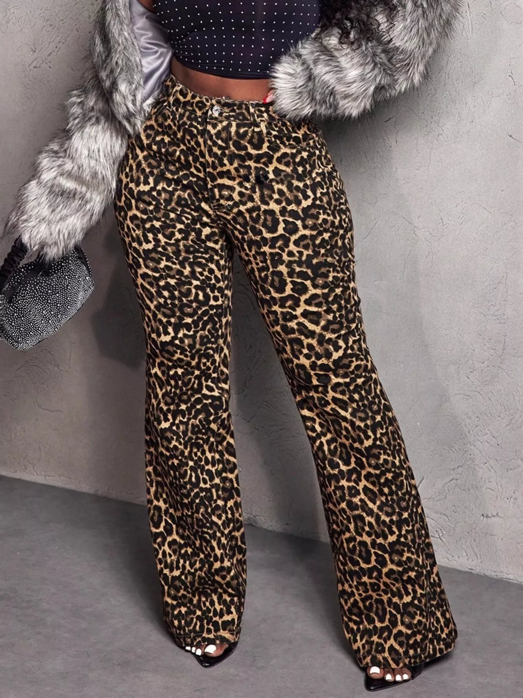Leopard print wide-leg pants from Shopimist displayed on a model, showcasing relaxed fit and bold animal pattern.