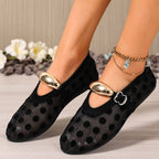 Women's polka dot mesh slip-on flats by Trendsi, lightweight casual walking shoes with breathable mesh material and comfortable fit.