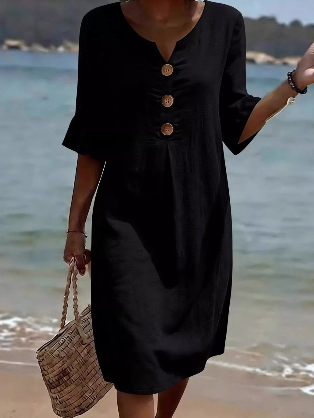 Plus size midi dress with ruffle sleeves and button decor from Trendsi, featuring a full-size, stylish and flowy design.