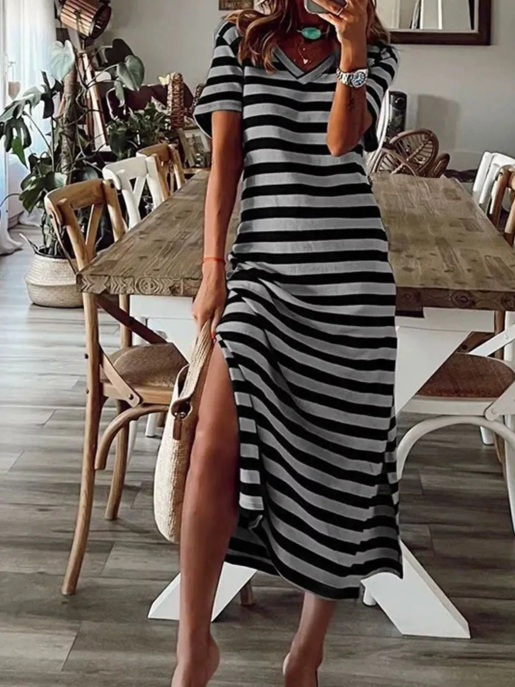 Full size striped V-neck midi dress with side slit from Trendsi, featuring a flattering fit and stylish design.