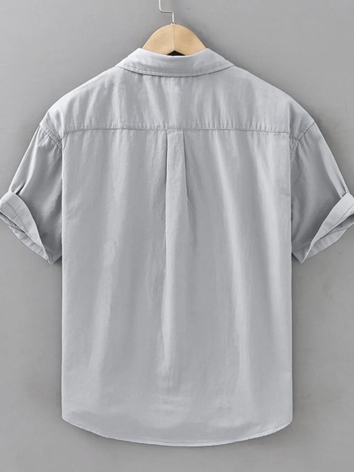 Men's plus size short sleeve button-up shirt by Plush Fashion Hub, featuring a casual style and plaid pattern.