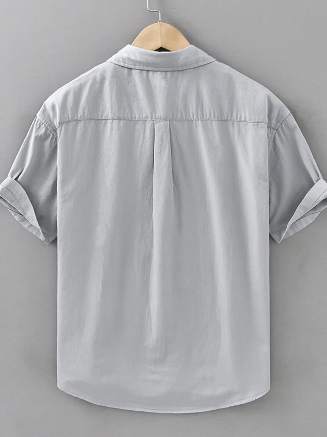 Men's plus size short sleeve button-up shirt by Plush Fashion Hub, featuring a casual style and plaid pattern.