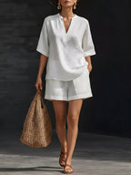 Plus size notched half sleeve top and shorts set by Trendsi, casual summer outfit with comfortable fabric and stylish design.