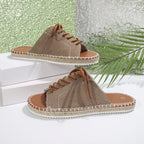 Women's lace-up open toe flat sandals in faux leather with ankle ties, stylish and comfortable footwear by Trendsi.
