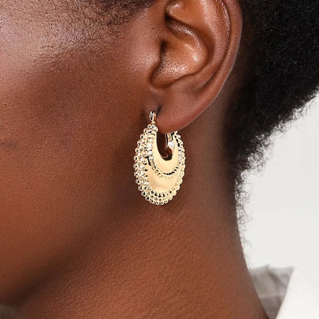 18K gold-plated alloy crescent moon hoop earrings with a sleek, polished finish and lightweight design.