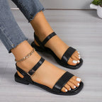 Women's open toe flat sandals by Trendsi with comfortable PU leather slides and stylish design, perfect for casual wear.