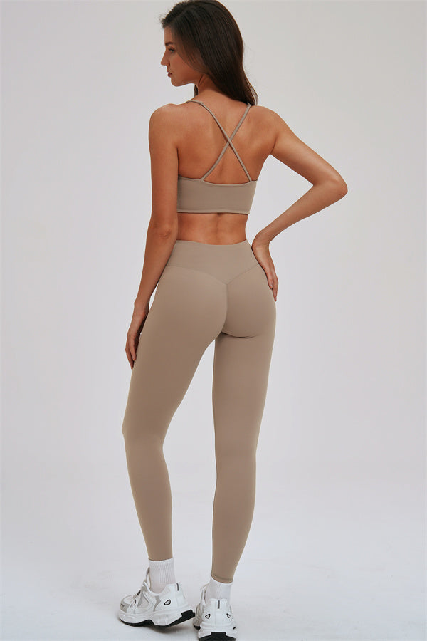Fitglutes activewear Kinetic cross-back sports bra and leggings 2-piece set for workout and gym activities.