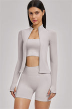 Fitglutes Activewear sports bra, shorts, and jacket set, designed for workout and gym activities, featuring breathable athletic fabric.