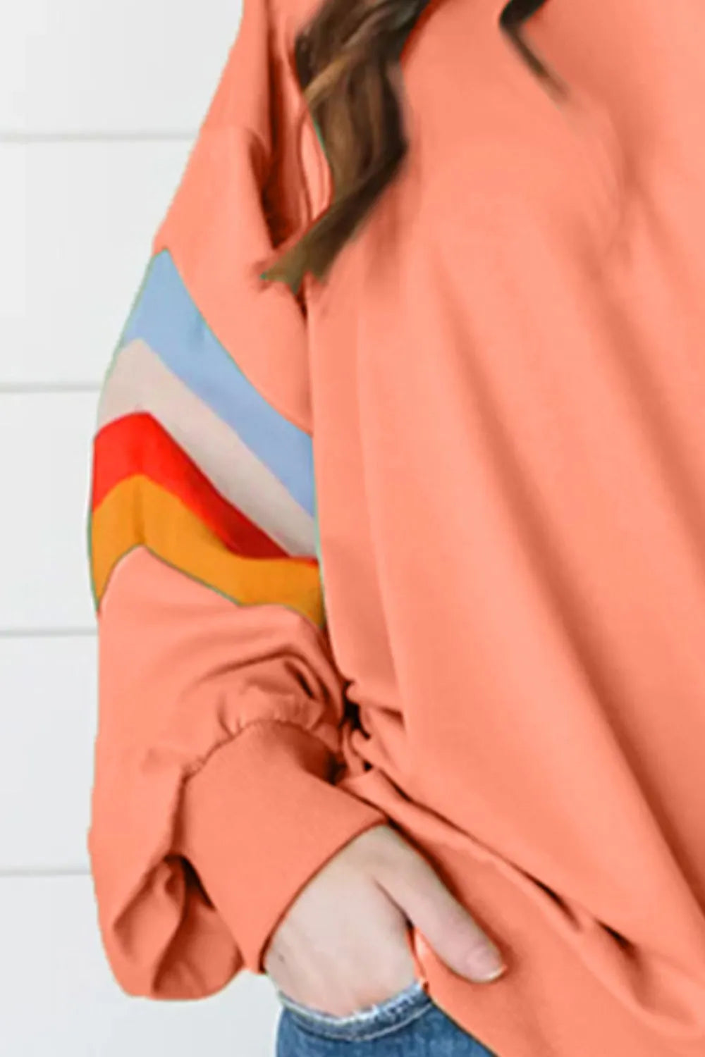 Contrast round neck long sleeve sweatshirt from Trendsi, showing a stylish top with a relaxed fit and color-block design.