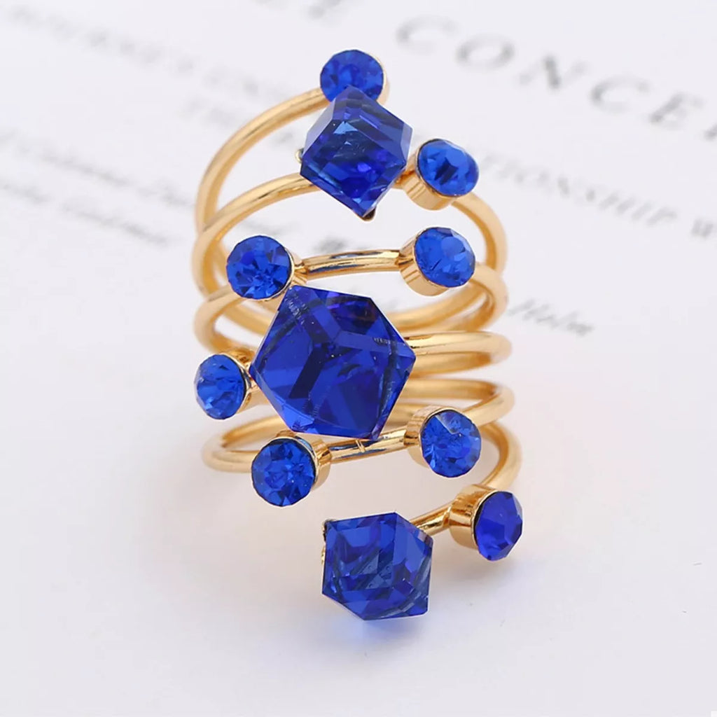 Multi-layered 18K gold-plated ring by Shopimist featuring intertwined bands and a shiny finish, stylish and versatile jewelry piece.