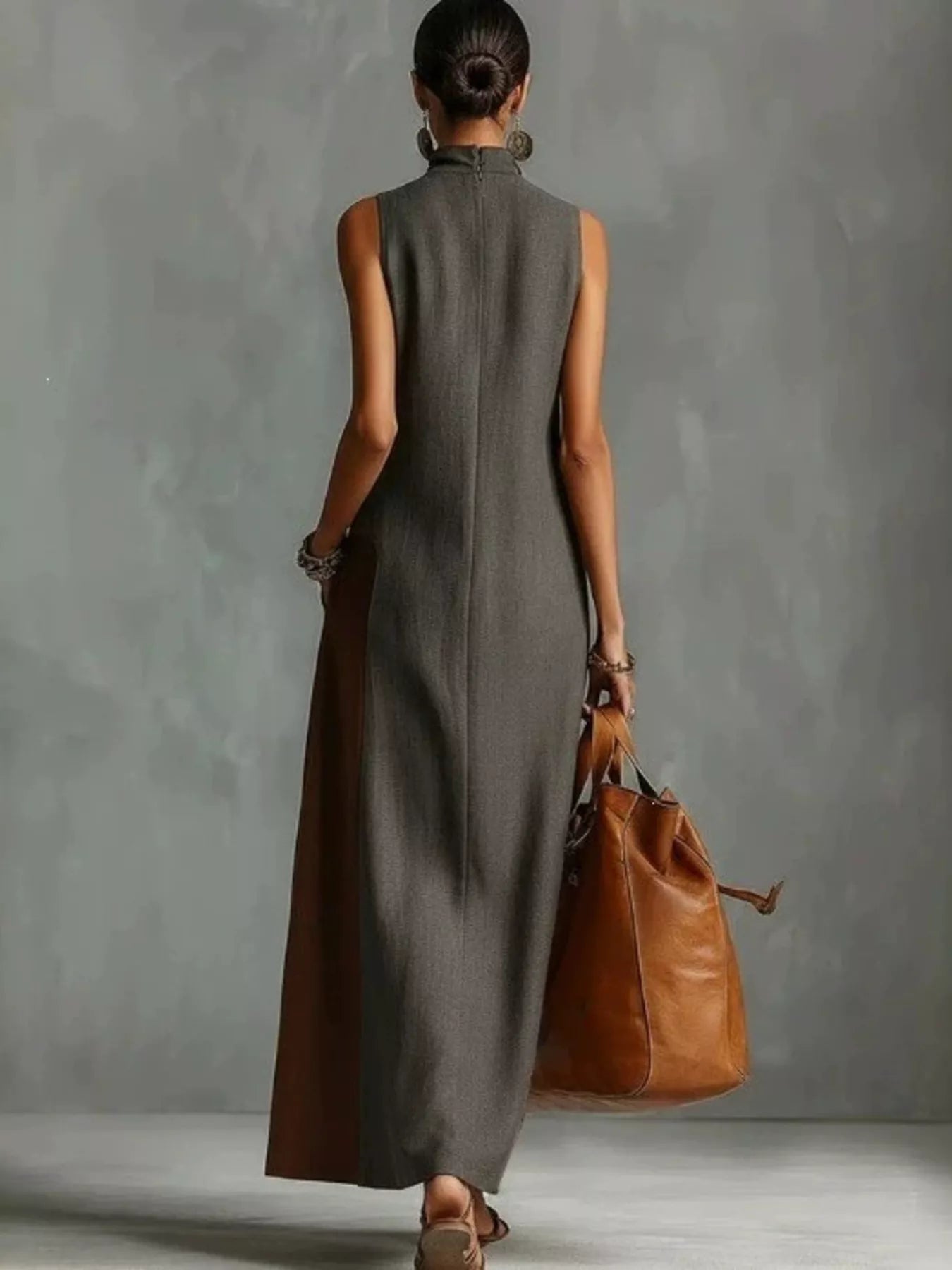 Plus size color block mock neck sleeveless maxi dress by Plush Fashion Hub, featuring a stylish full-length design and vibrant color blocks.