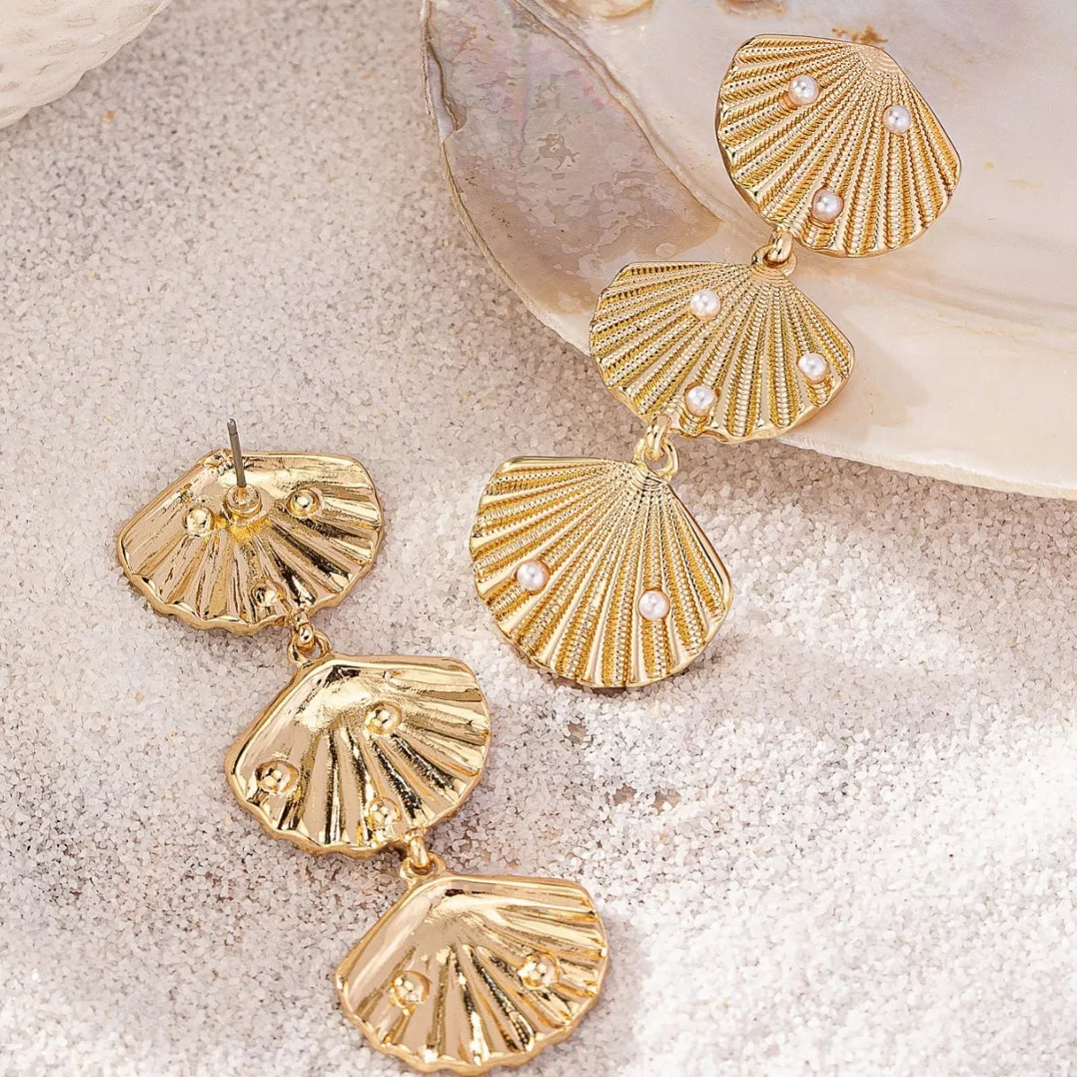 Seashell dangle earrings with pearl accents and silver hooks, elegant jewelry accessory, Shopimist brand, natural beach-inspired design