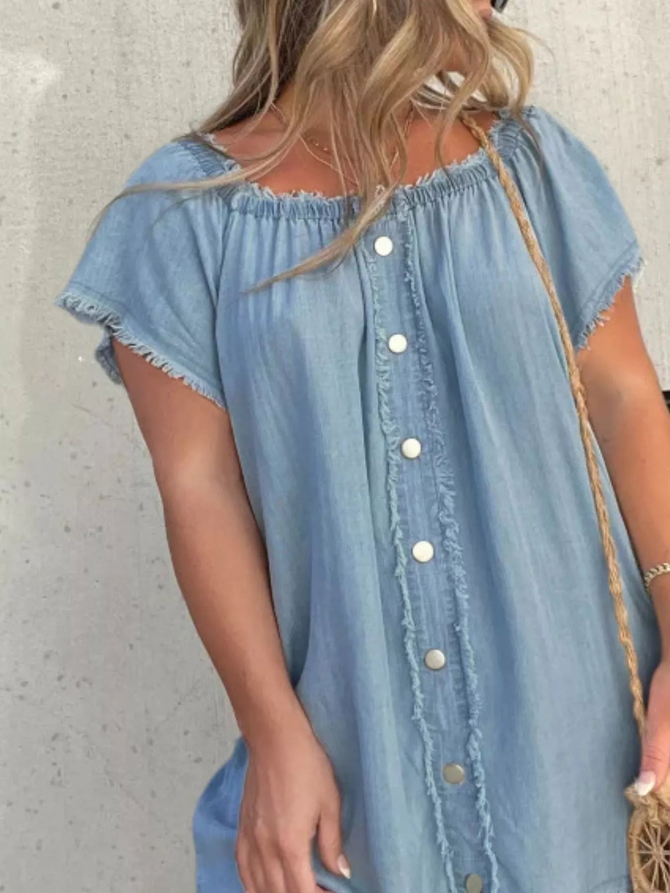Plus size off-shoulder denim dress with button-down front and frayed hem, stylish Trendsi dress for casual wear.