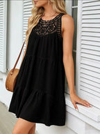 Lace detail sleeveless dress by Shopimist featuring intricate lace accents and a flowing silhouette, displayed on a hanger.
