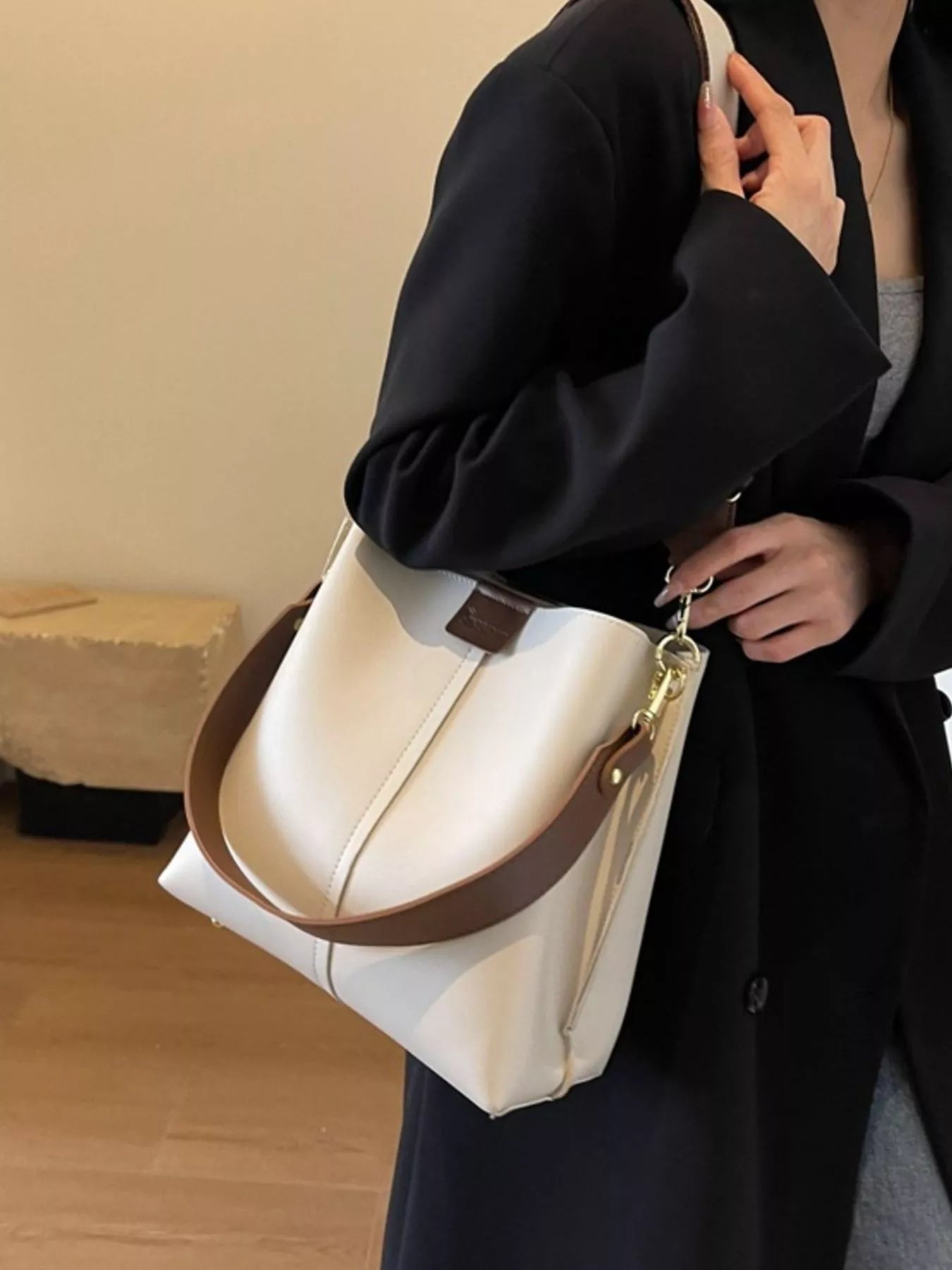 Plush Fashion Hub PU leather crossbody handbag with adjustable strap and gold-tone hardware, stylish for everyday use.