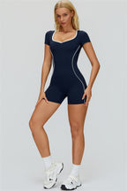 Fitglutes The Whisper Romper in sleek, fitted gymwear with adjustable straps and breathable fabric for activewear workouts.