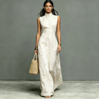 Women's sleeveless midi dress with stand collar and single-breasted design by FitiqueFit, casualwear style, shown on a model.