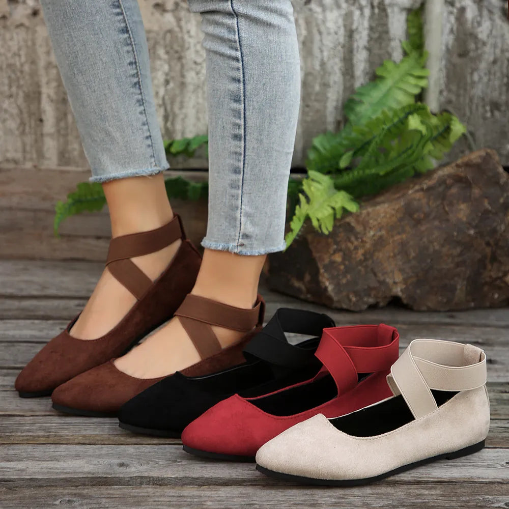 Women's crisscross point toe flat slip-ons by Trendsi, stylish and comfortable flat shoes with a sleek design.