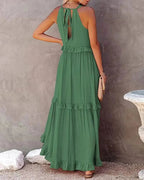 Elegant apricot ruffle maxi dress by Plush Fashion Hub, casualwear style with flowing fabric and ruffled details.