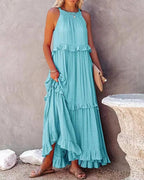 Elegant apricot ruffle maxi dress by Plush Fashion Hub, featuring flowing fabric and stylish ruffle details, perfect for casual wear.