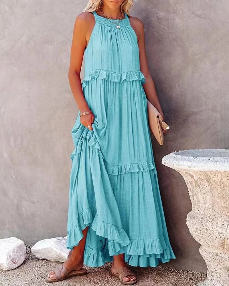 Elegant apricot ruffle maxi dress by Plush Fashion Hub, featuring flowing fabric and stylish ruffle details, perfect for casual wear.