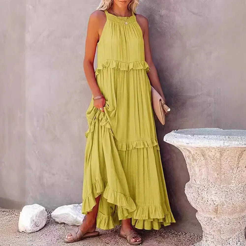 Elegant apricot ruffle maxi dress by Plush Fashion Hub, featuring flowing fabric and stylish ruffle details for casual wear.