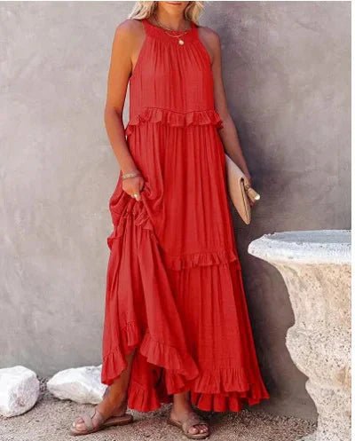 Elegant apricot ruffle maxi dress by Plush Fashion Hub, featuring flowing fabric and stylish ruffle details, perfect for casual wear.