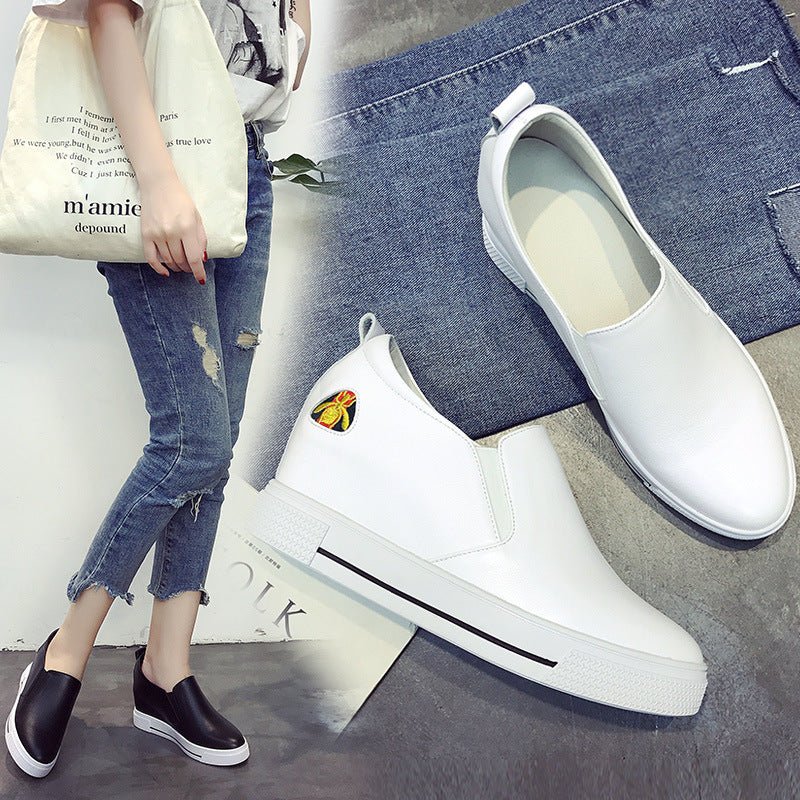 Elevated slip-on women's thick sole shoes in black with a cushioned platform from Plush Fashion Hub.