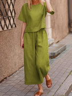 European and American women's linen two-piece casual suit in solid color, featuring a loose, comfortable fit and stylish design.