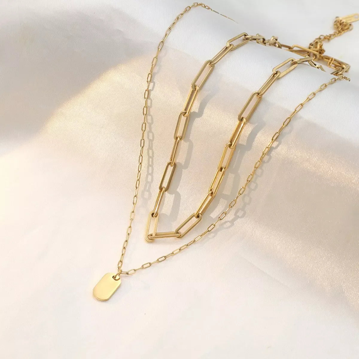 18K gold-plated double layered necklace from Plush Fashion Hub, featuring delicate chain layers and elegant design.