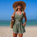 Women's minimalist FitiqueFit sleeveless one-piece swimsuit in solid color, stylish swimwear with a sleek, streamlined design.