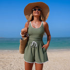 Women's minimalist FitiqueFit sleeveless one-piece swimsuit in solid color, stylish swimwear with a sleek, streamlined design.