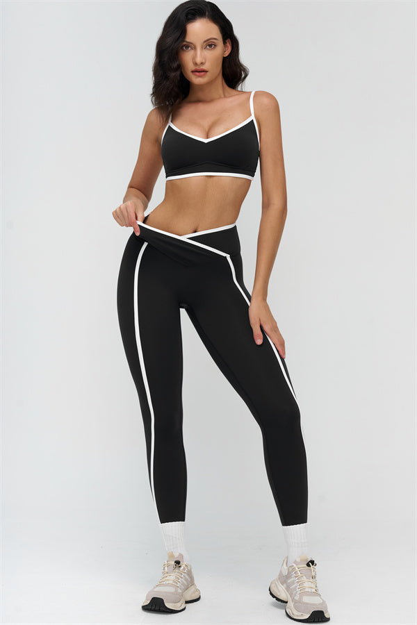 Fitglutes activewear Crave Contrast Sports Bra and Leggings 2-piece set, featuring black and white color blocking for workout and gym.