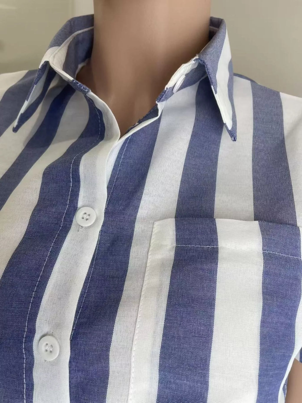 Striped button-up top and shorts set by Shopimist, featuring a casual, coordinated outfit with a collar and front buttons.